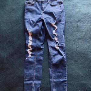 Super Distressed Denim Jeans